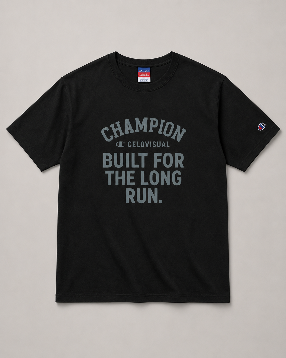 Black t-shirt with text and Champion logo on a gray background