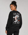 Person wearing a black sweatshirt with graphic design and text on the back