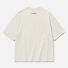 Beige t-shirt with 'CVSL' logo on the back against a white background