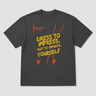 Gray t-shirt with yellow and red text on a light gray background