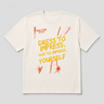 White t-shirt with yellow and red text on a light gray background