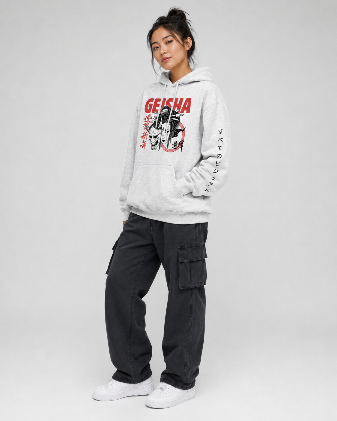 Person wearing a hoodie with 'Geisha' design on a white background