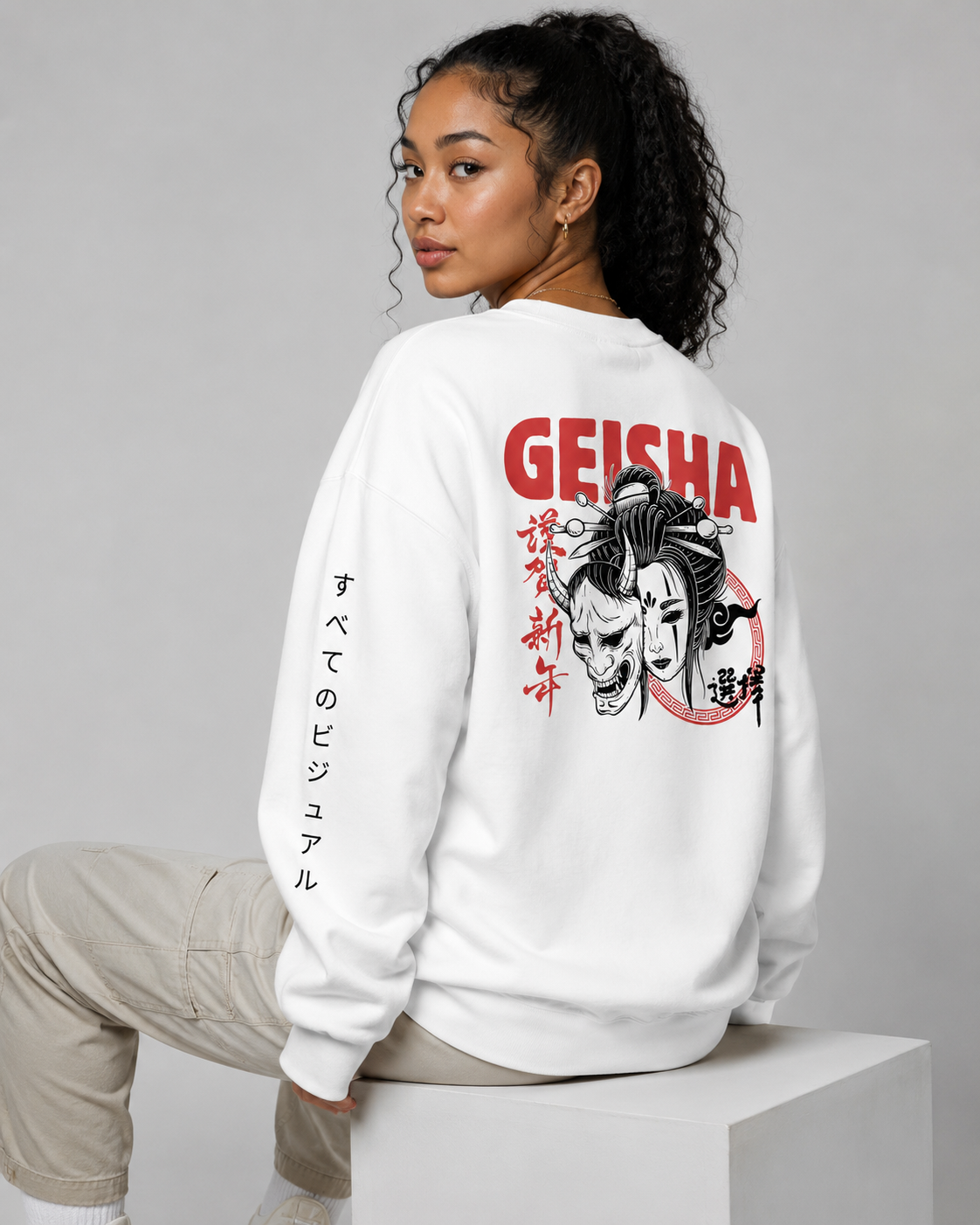 Person wearing a white sweatshirt with Geisha design and text on the back