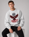 Person wearing a white sweatshirt with a red and black graphic design on a gray background