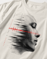 T-shirt with a graphic design of a face and sound wave, text 'Every silence has a signal', on a beige background.