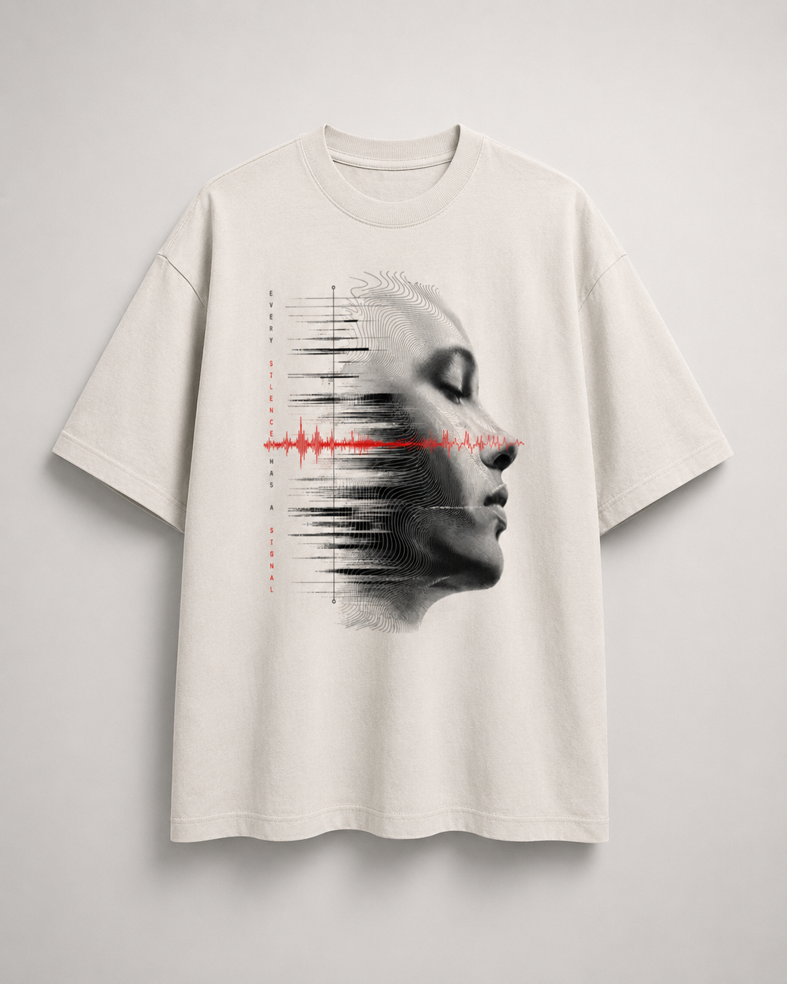 White t-shirt with a graphic design of a face and sound wave on a light gray background