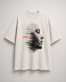 White t-shirt with a graphic design of a face and sound wave on a light gray background