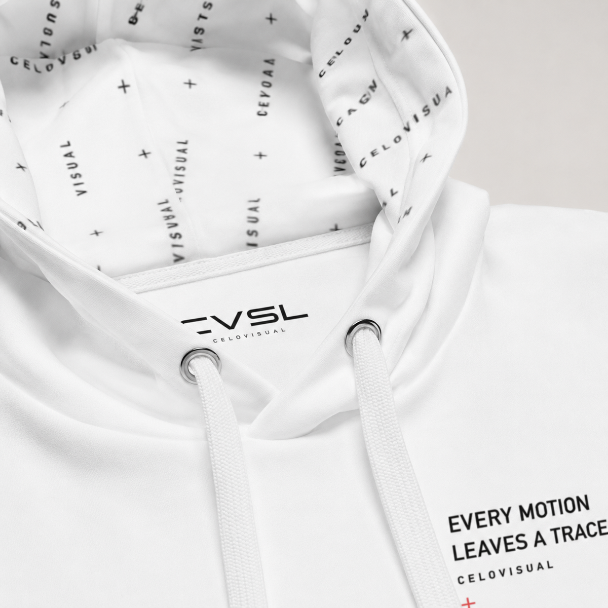 White hoodie with text and brand logo on a light gray background