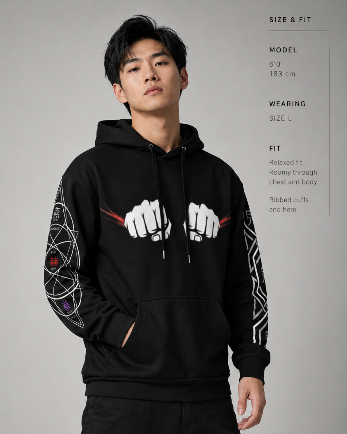 Person wearing a black hoodie with white graphic design on sleeves against a gray background