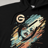 Black hoodie with a colorful graphic design of a face and the letter 'G' on a gray background