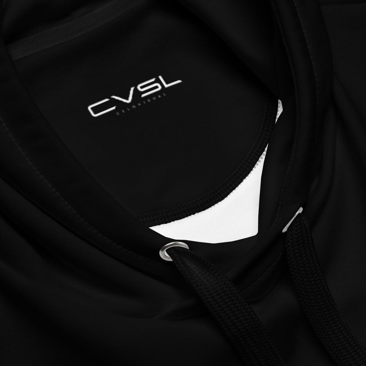 Close-up of a black hoodie with a small logo on the chest.