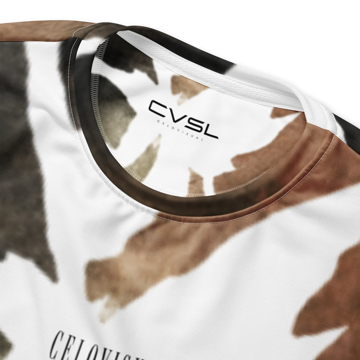 Close-up of a tie-dye shirt with 'CVSL' branding on a white background
