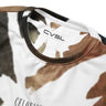 Close-up of a tie-dye shirt with 'CVSL' branding on a white background