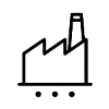 Black line drawing of a factory on a white background